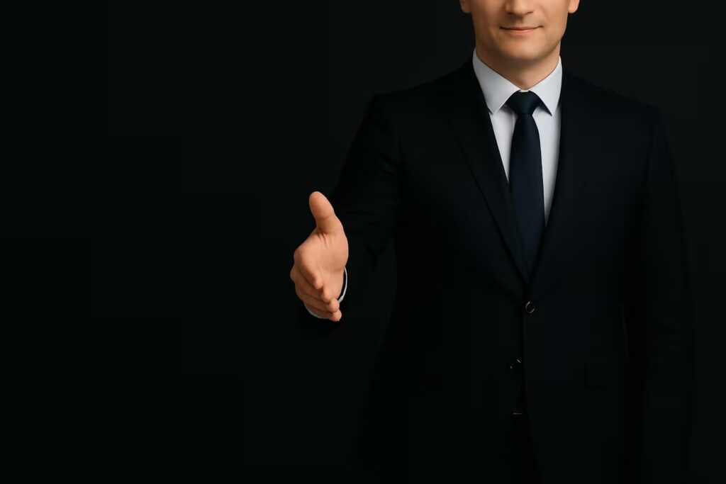 Professional Marketing Consultant Cornwall team discussing a marketing strategy in a modern office.